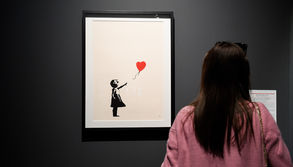 Quadro di Banksy Bambina e palloncino. Cosa significa?